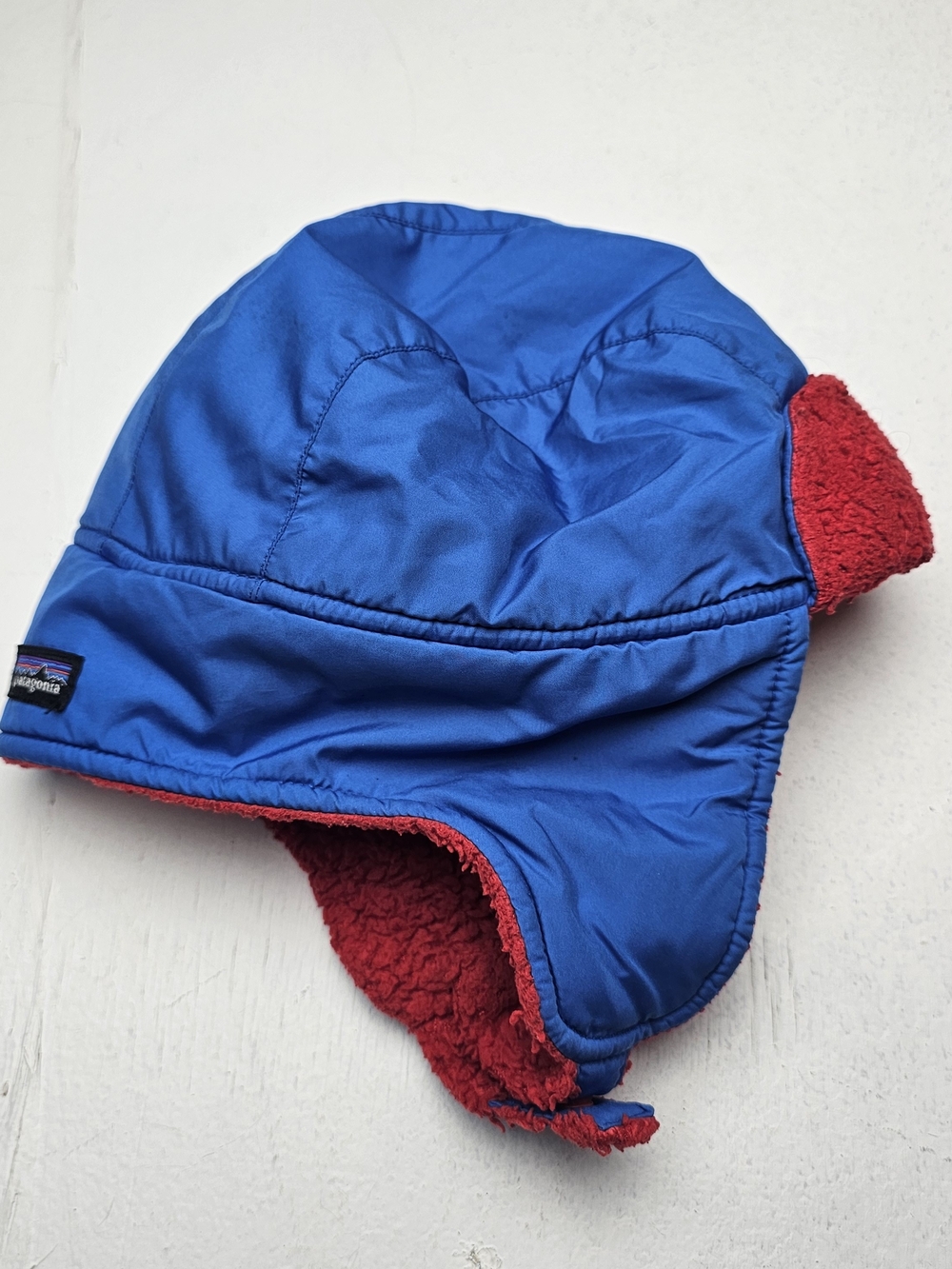 Patagonia Infant Blue and Red Trapper Hat with Sherpa Lining